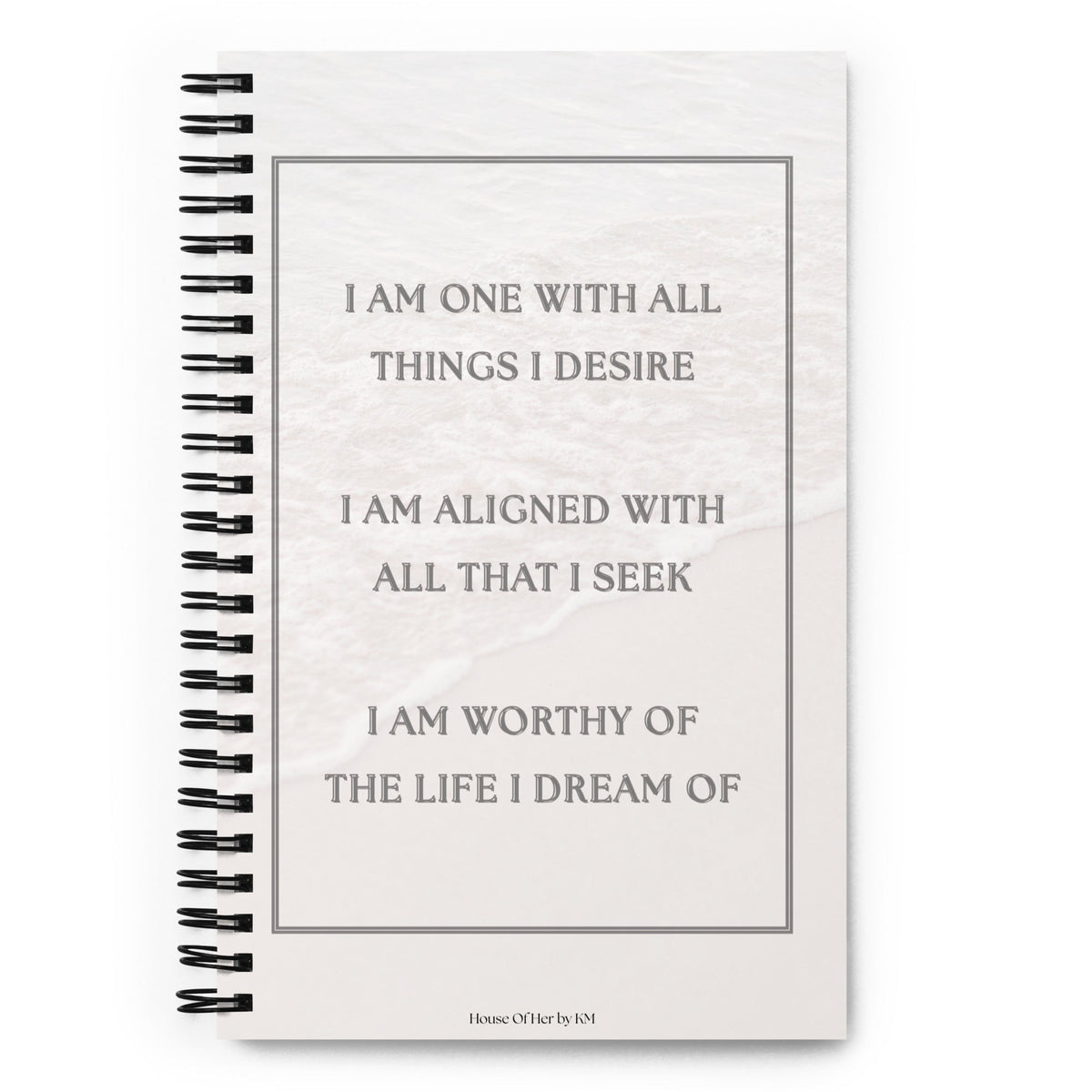 I Am One Manifestation Notebook, with three affirmations printed on the cover