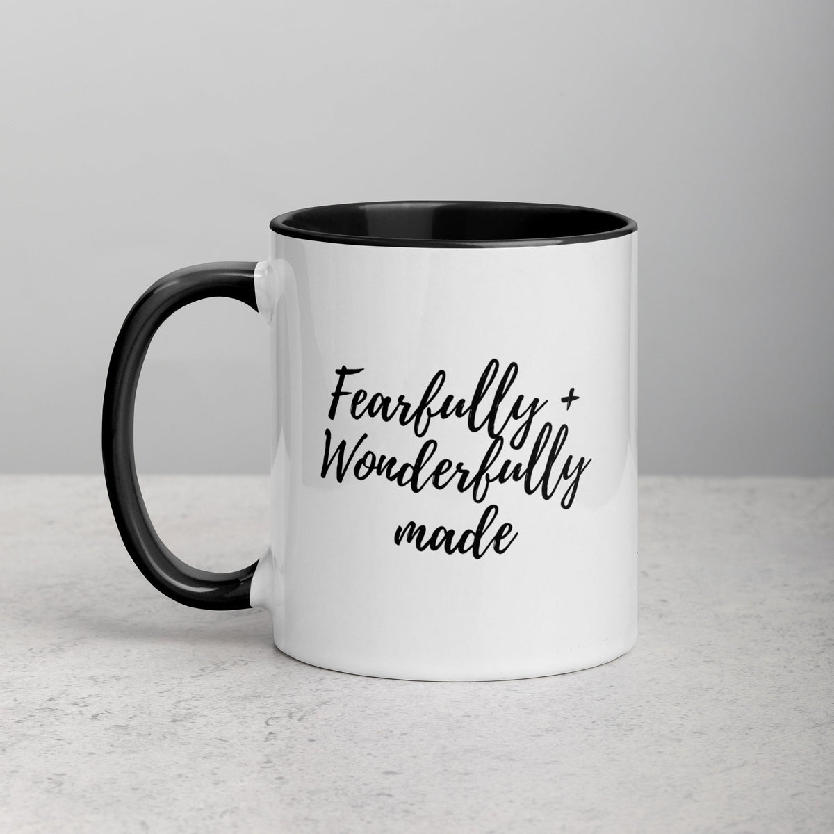 Fearfully And Wonderfully Made Mug, a white mug with a black interior and handle
